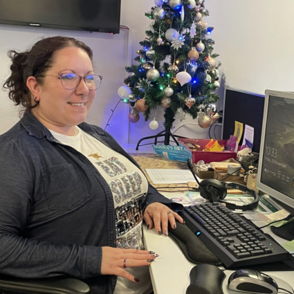 Adult woman sitting at desk